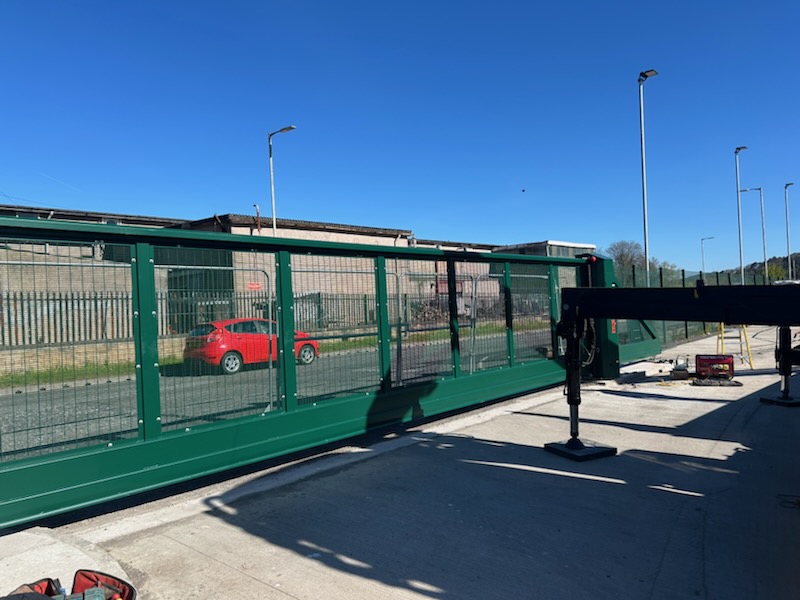Heavy duty sliding security gate installed at an industrial site